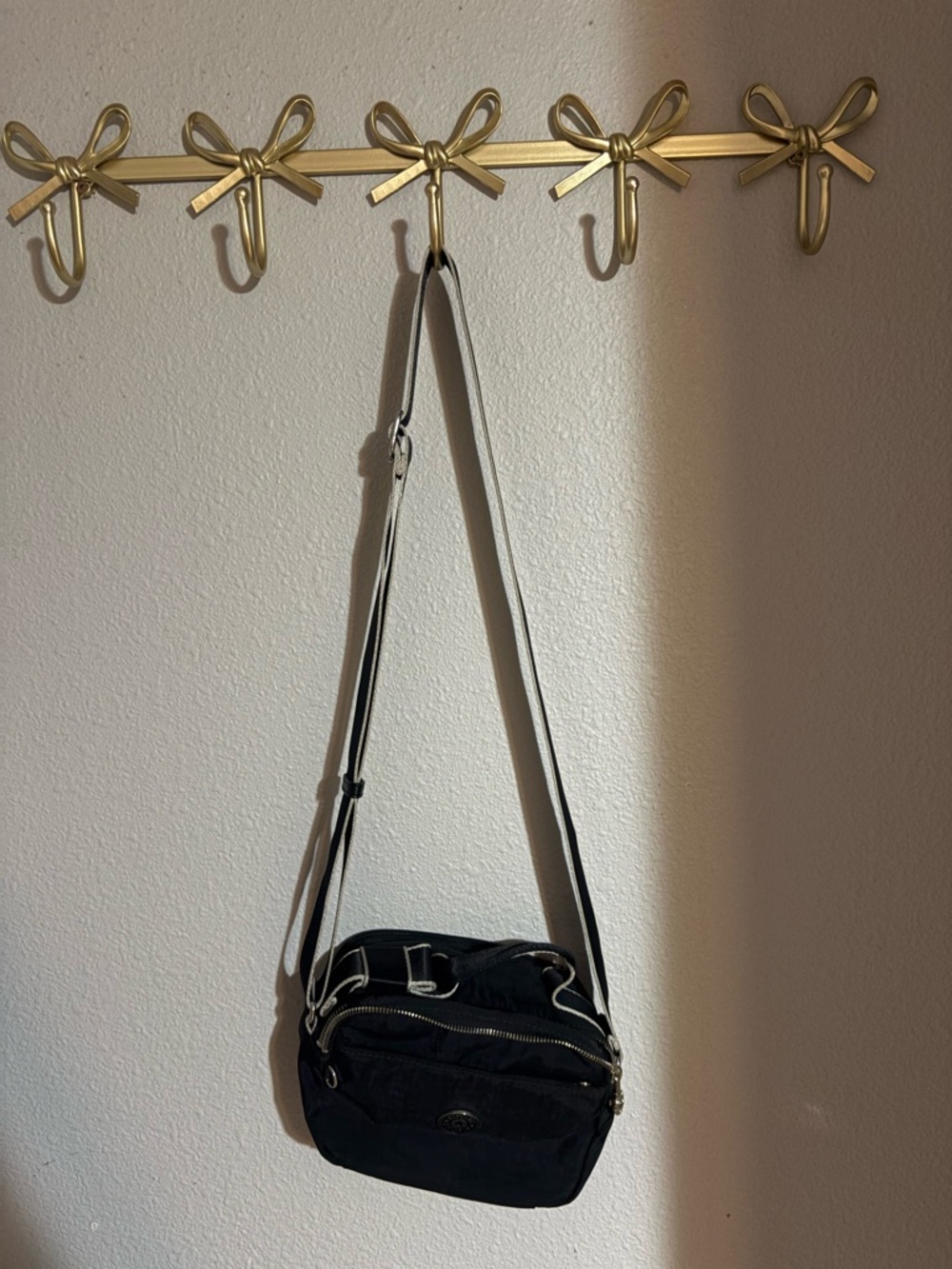 Kipling Black Crossbody Bag with White-Trim Strap